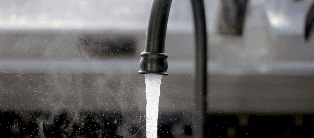 Faucet drinking water - photo by Imani in Unsplash