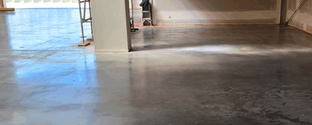 Floor slab hard trowelled burnished unsuitable for direct stick flooring