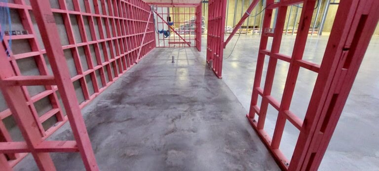 Exposed concrete underfoot at the IBEX warehouse