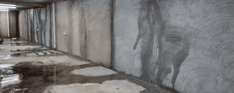 Concrete basement watertight seepage leaking waterproofing required