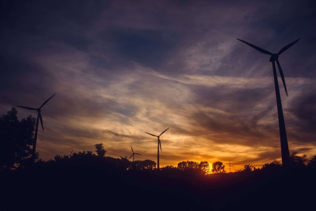 black windmills during sunset 671585 scaled 1